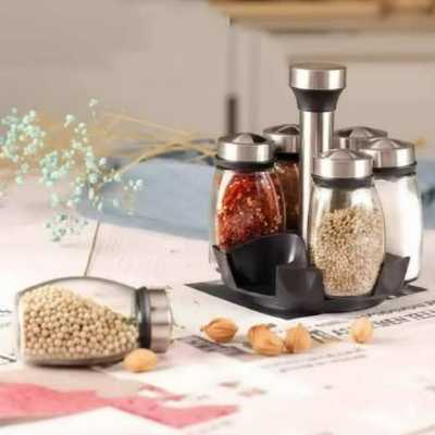 ستاند بهارات دوّار مع 7 مرطبانات زجاج 4